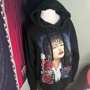 Black Hoodie with Iconic Graphic and Floral Accents